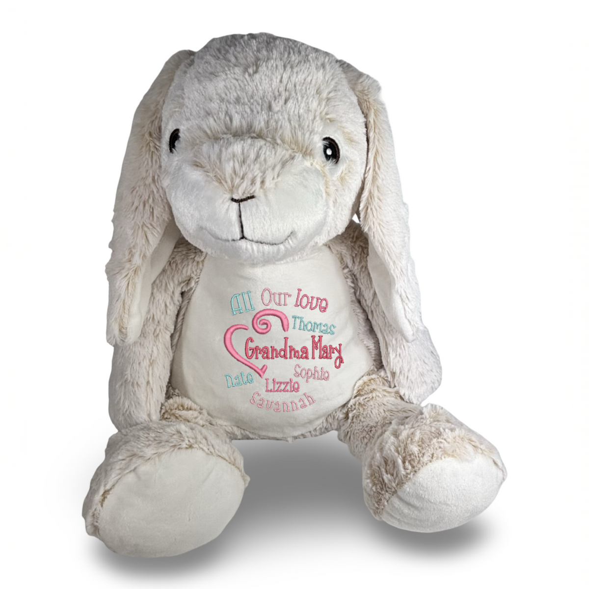 Plush bunny toy with embroidered message on a white background