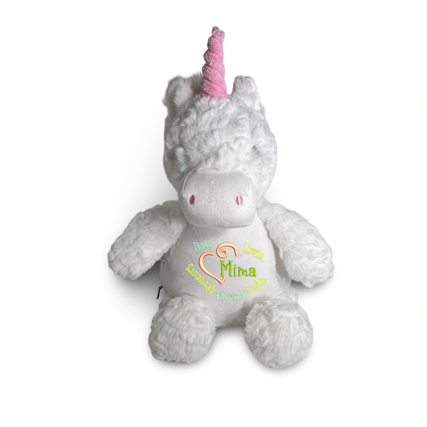 Plush unicorn toy with a pink horn on a white background