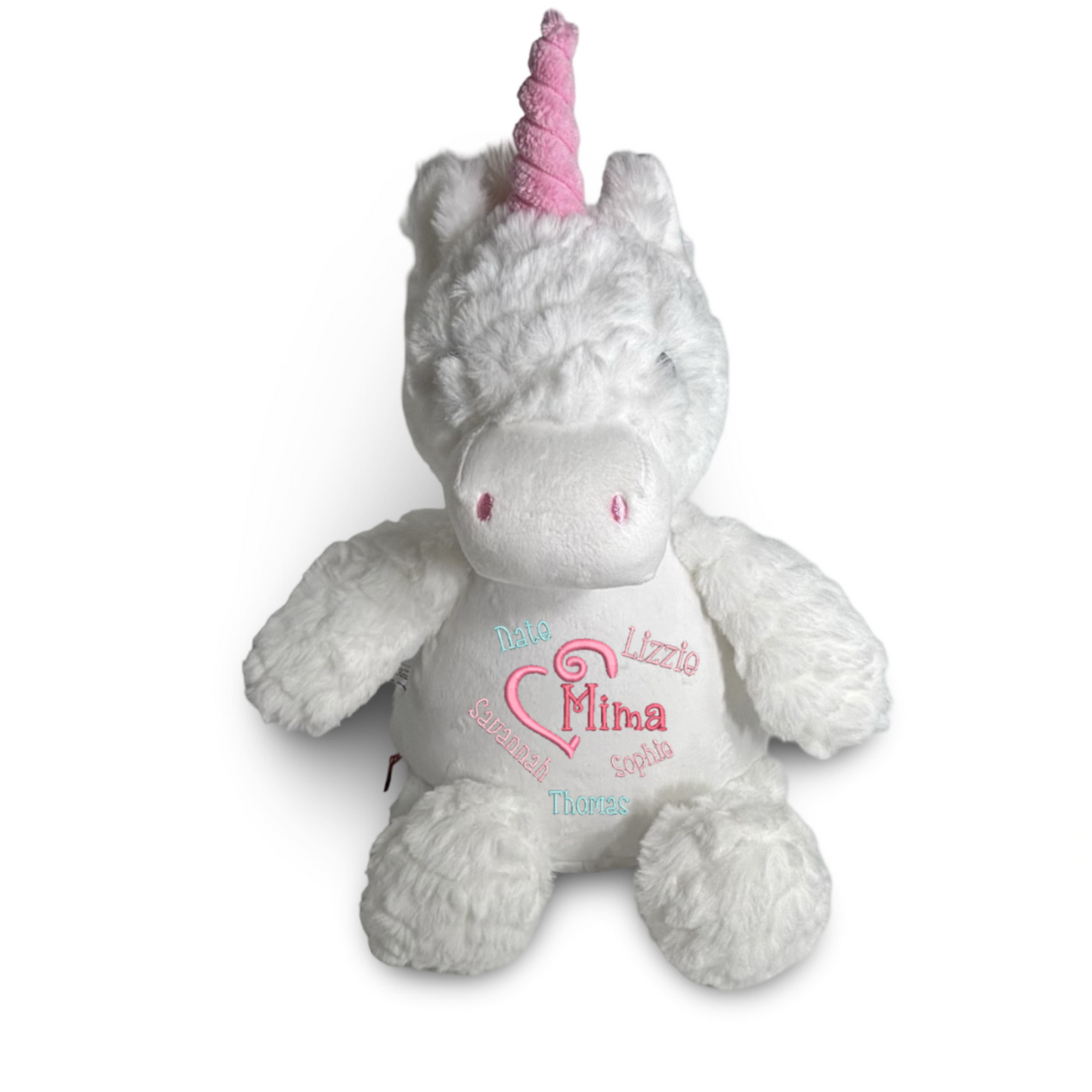 Plush unicorn toy with pink horn and embroidered text on a white background